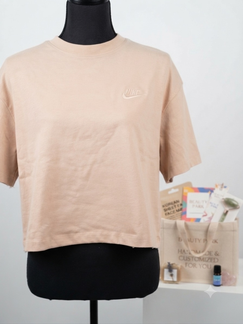 Nike Women's Cropped Crew Tee in Light Beige